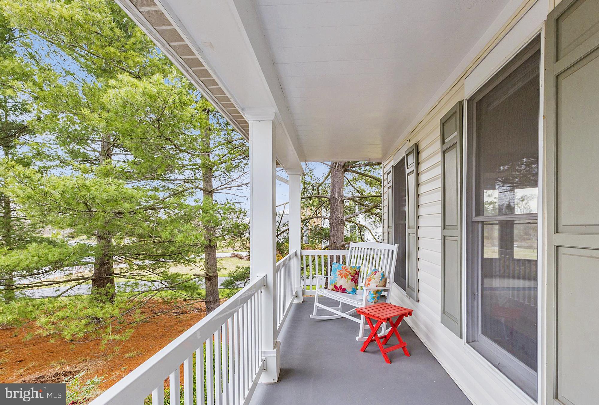 17005 Spates Hill Road Poolesville, MD 20837 - Photo 2 of 25 a sitting area with furniture and garden view
