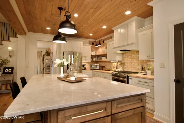 a bedroom with a bed and furniture