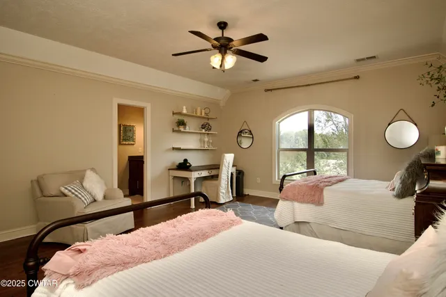 a white toilet sitting next to a shower curtain