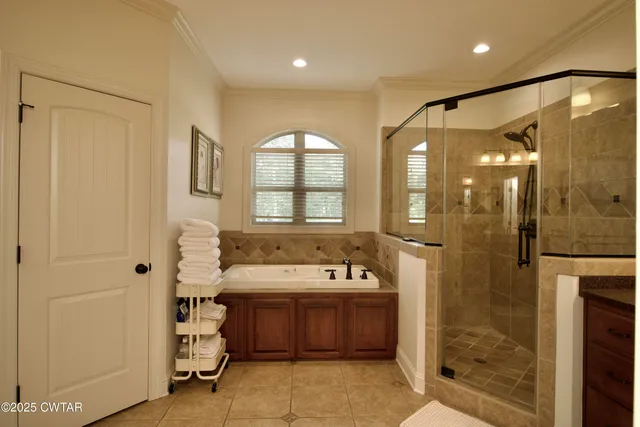 a bathroom with a toilet a sink and a mirror