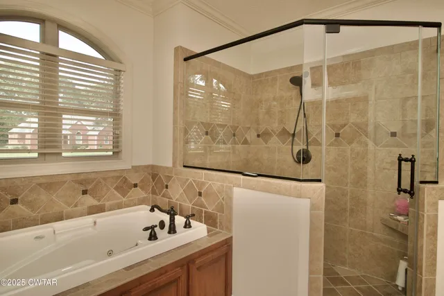 a bathroom with a toilet a sink and a mirror