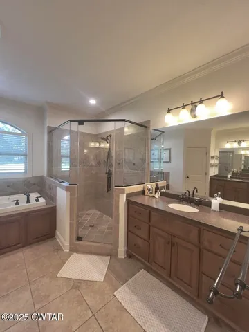 a view of a chairs and table in a patio