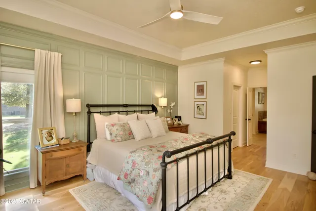 an aerial view of a house with garden space and street view