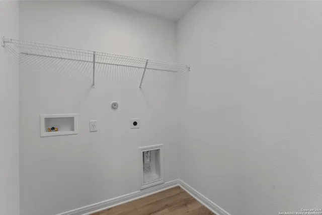 a view of a room with racks on the wall