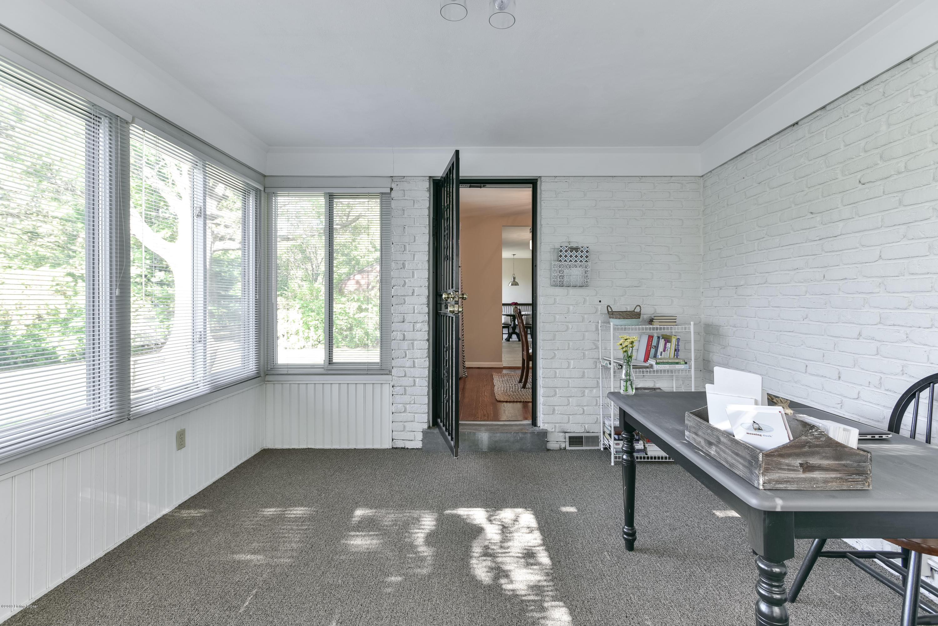 3110 Sherbrooke Road Louisville, KY 40205 - Photo 27 of 69 The room is encompassed by windows with views of the fully fenced backyard