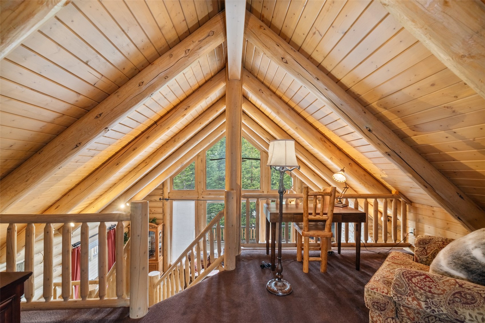 243 Rena Road Breckenridge, CO 80424 - Photo 9 of 50 Living area with vaulted ceiling with beams, log walls, and wood ceiling