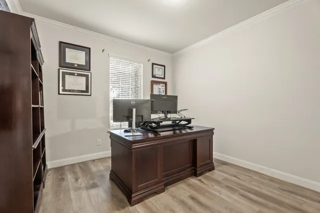 a kitchen with stainless steel appliances granite countertop a stove and a refrigerator