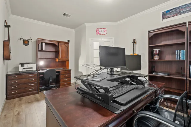 a kitchen with a appliances and cabinets