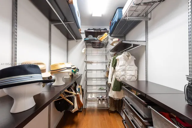a view of storage and utility room with racks on the wall