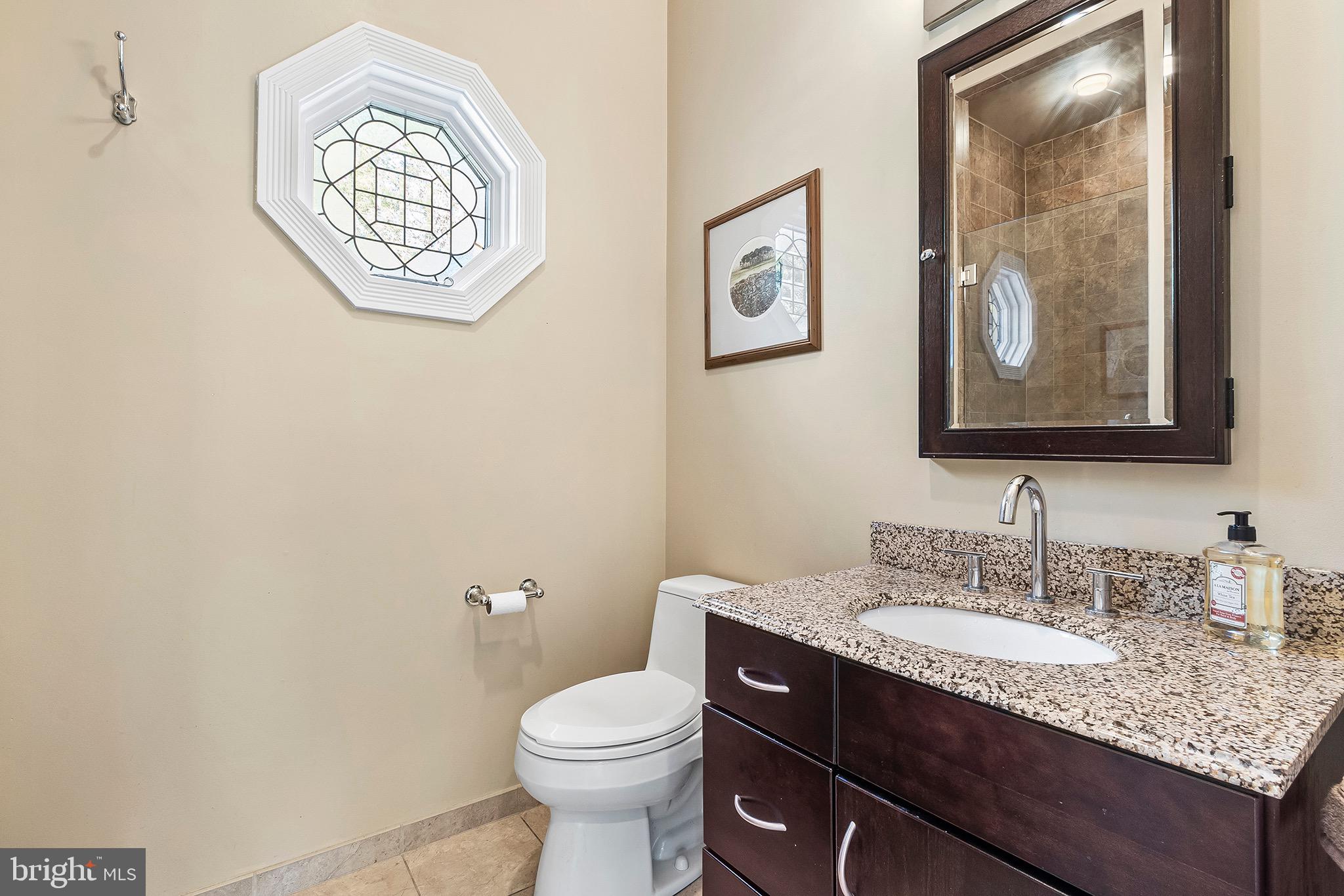 102 North Waterloo Road Devon, PA 19333 - Photo 19 of 46 Main floor bathroom w/ charming window