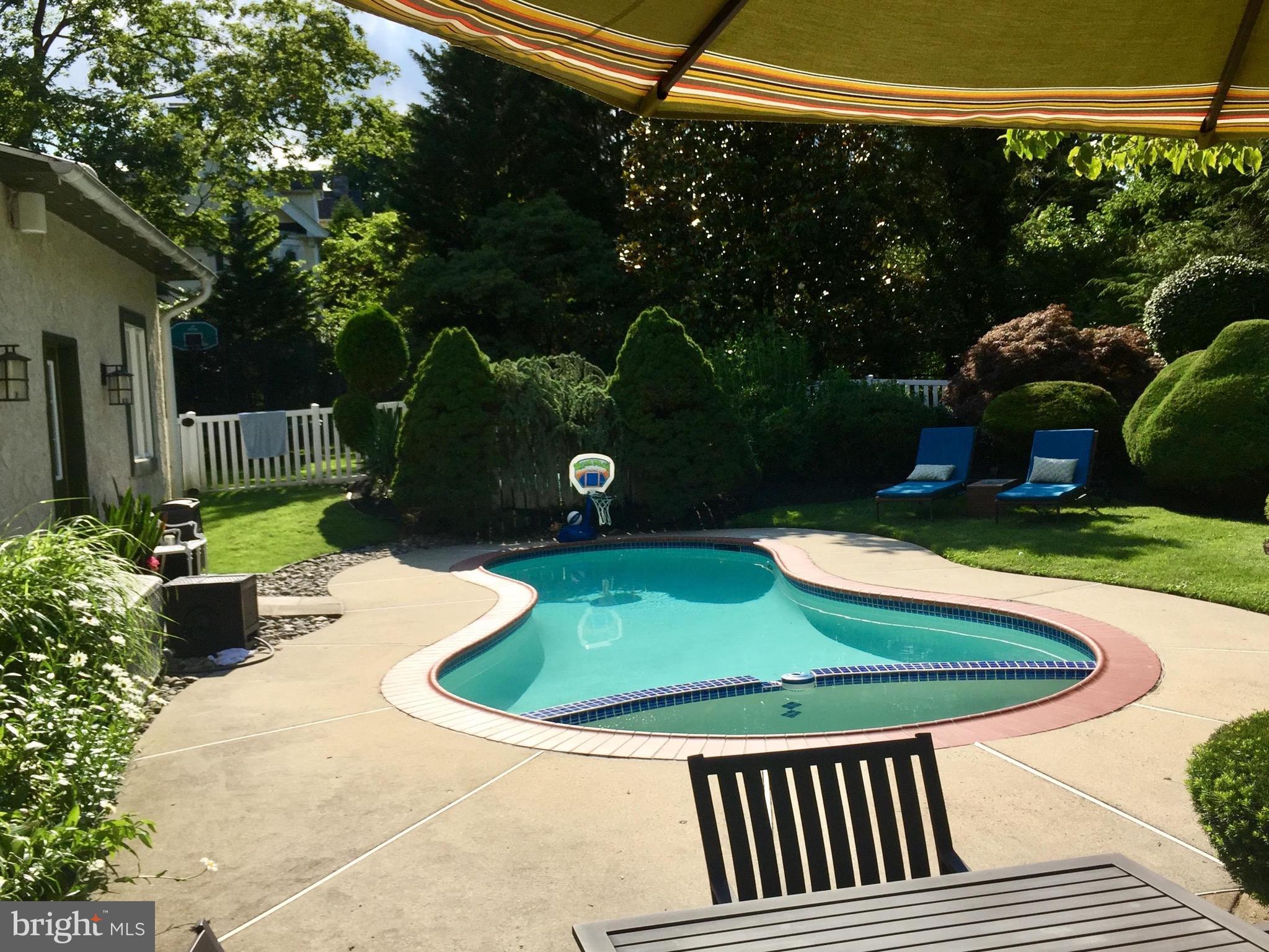 102 North Waterloo Road Devon, PA 19333 - Photo 39 of 46 Pool w/ lawn