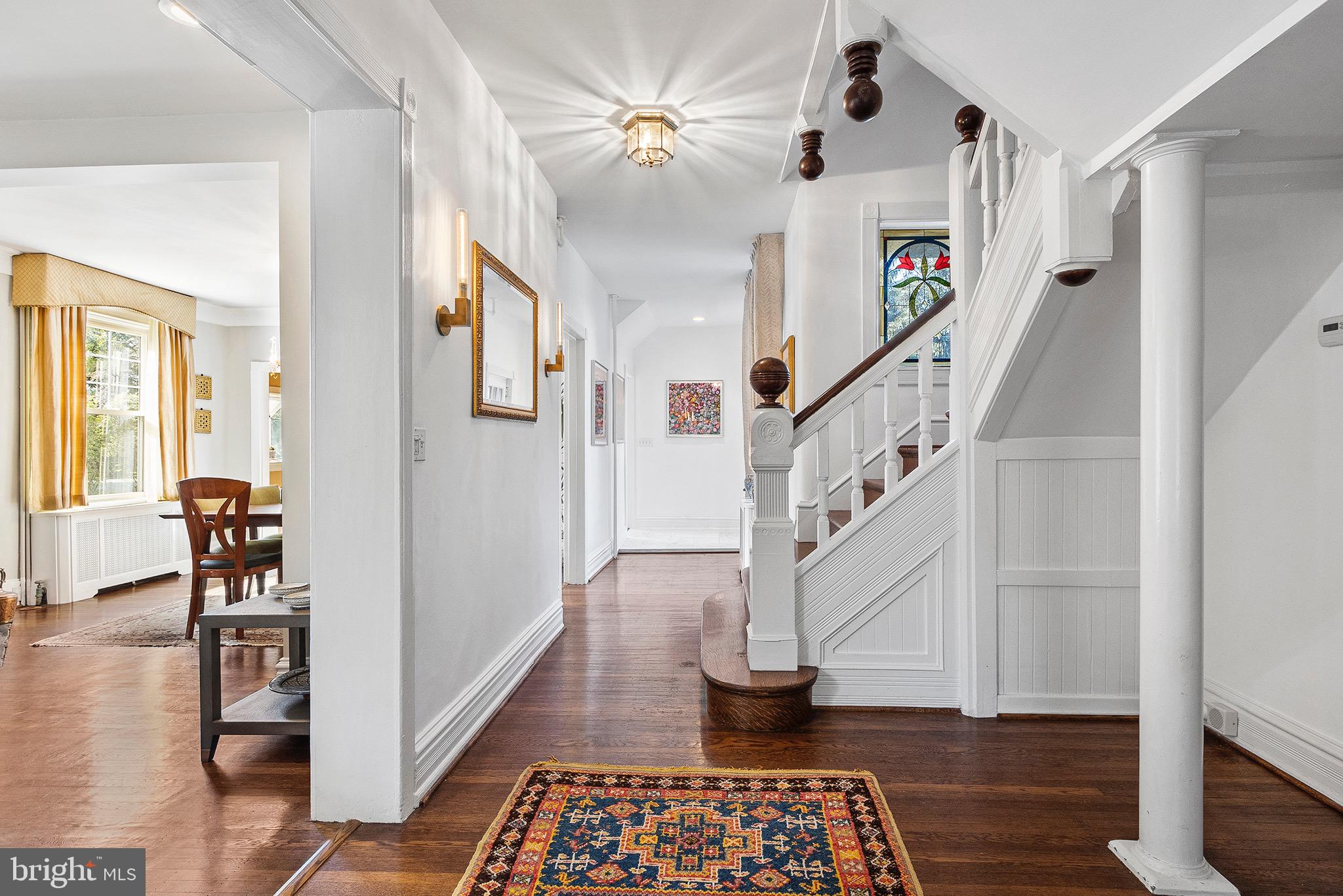 102 North Waterloo Road Devon, PA 19333 - Photo 6 of 46 Main hallway - high ceilings & gleaming hardwoods