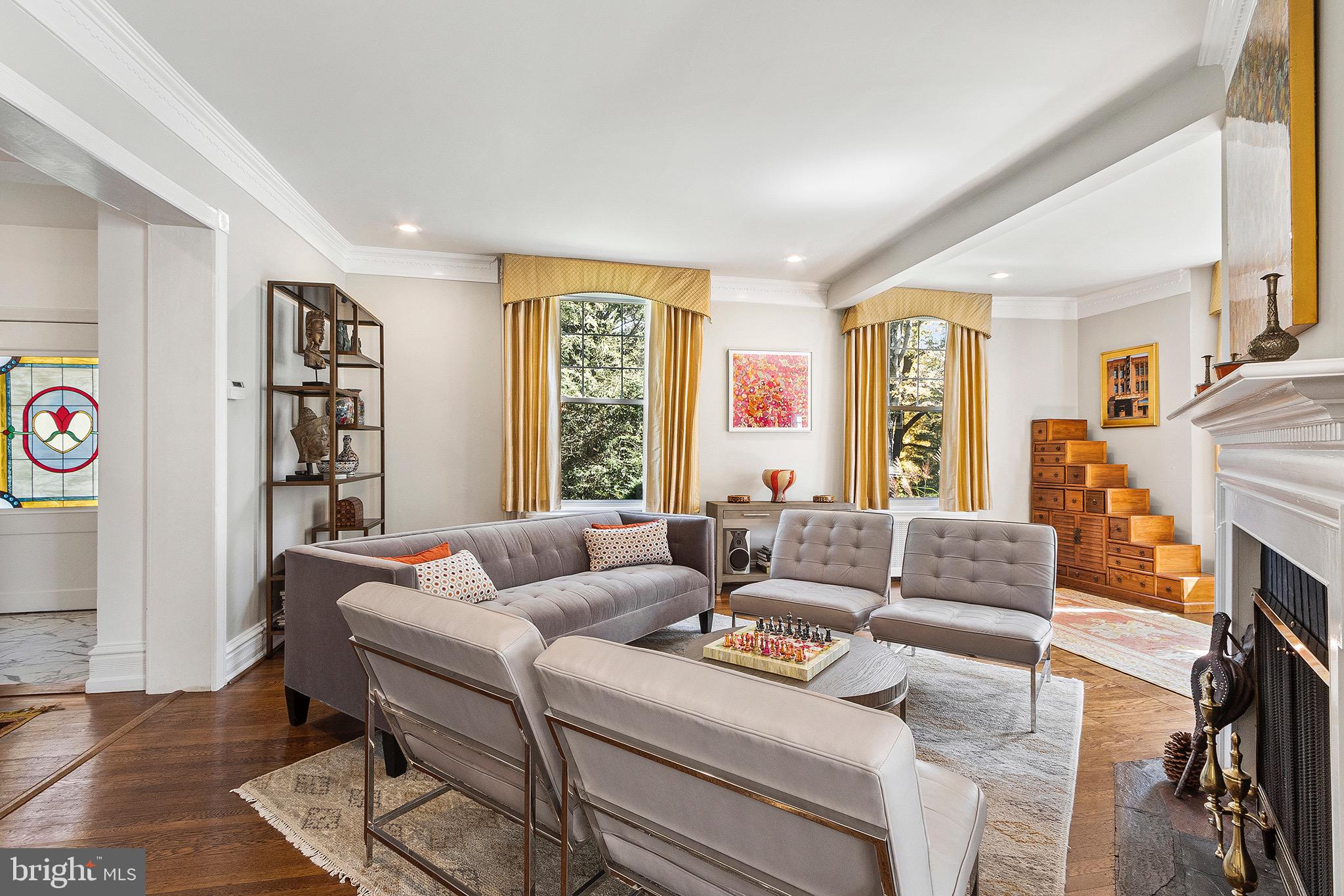 102 North Waterloo Road Devon, PA 19333 - Photo 9 of 46 Living room w/ gas FP & hardwoods
