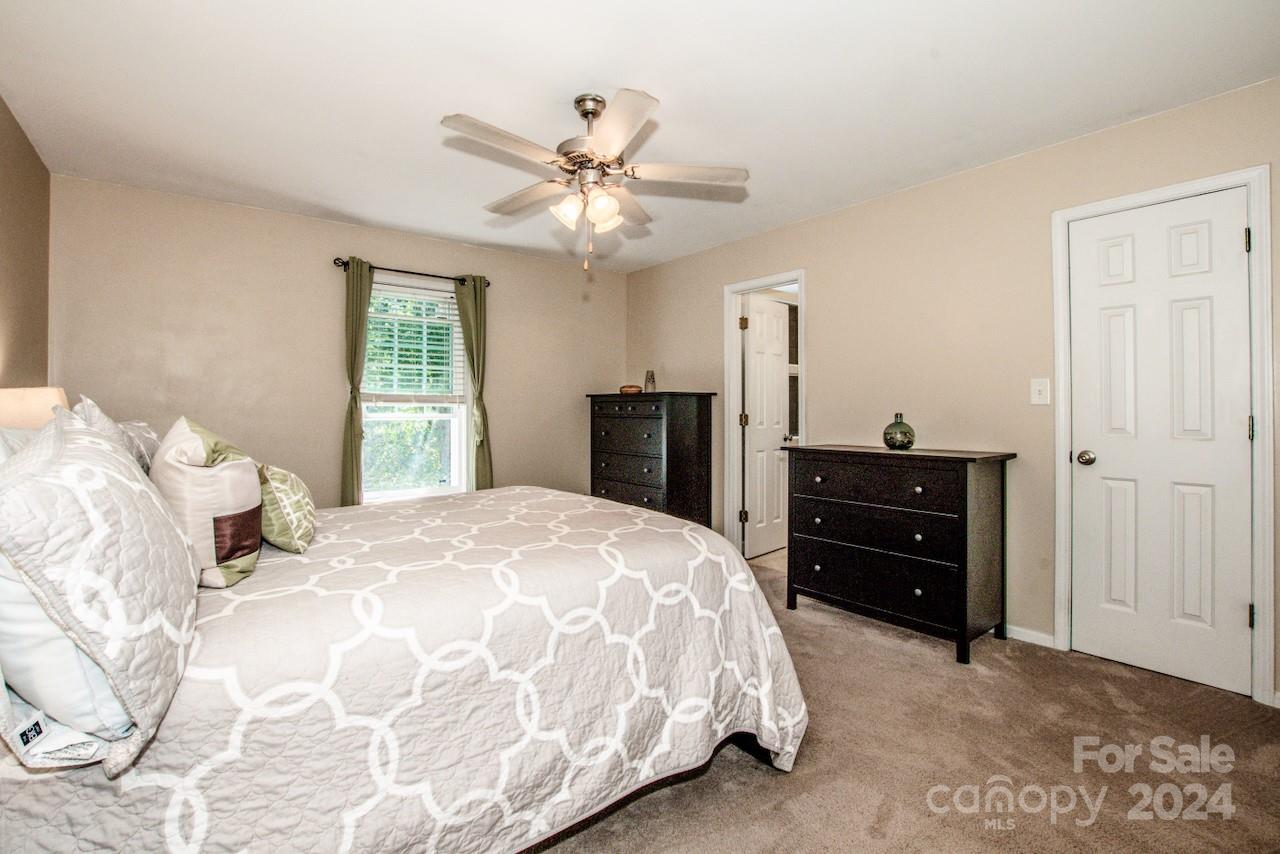 3510 Mack Ballard Road Maiden, NC 28650 - Photo 16 of 26 a bedroom with a bed and window