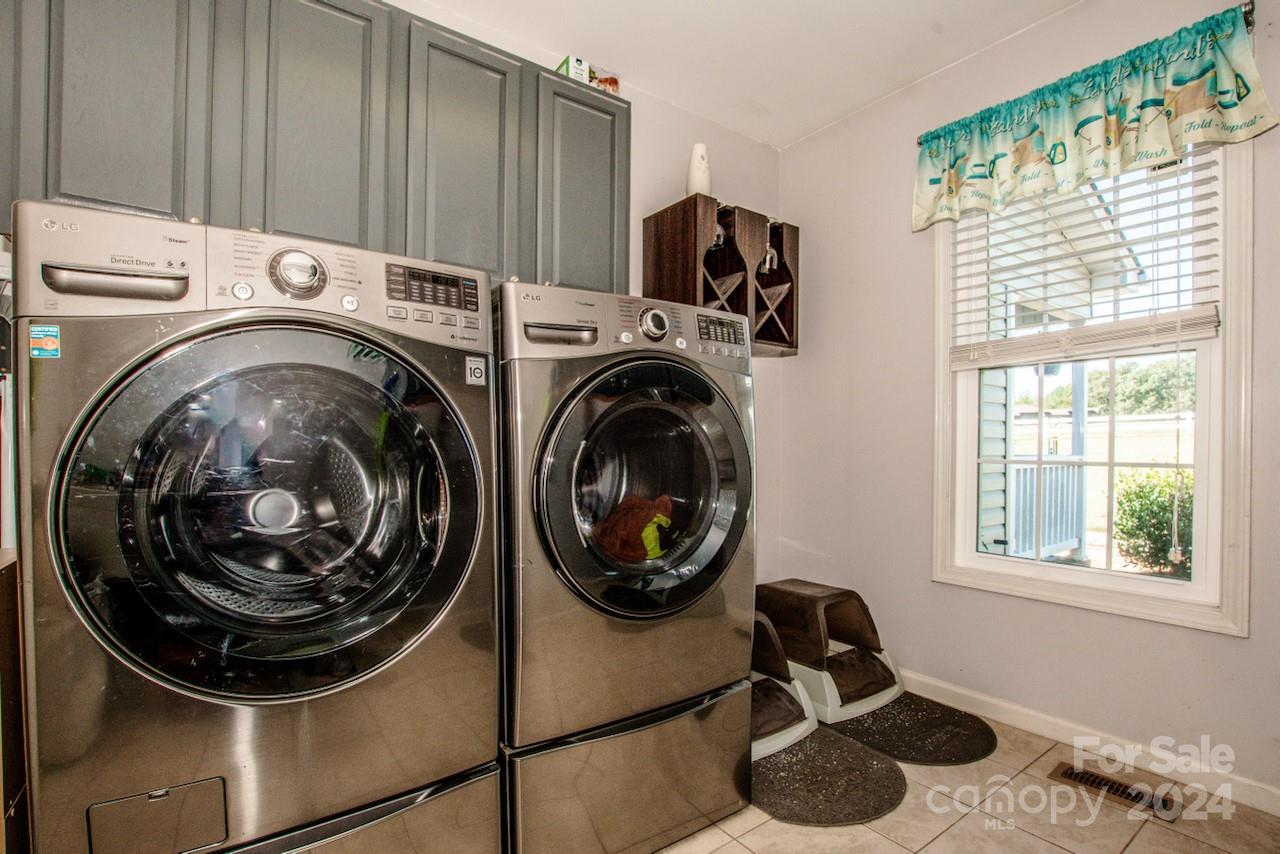 3510 Mack Ballard Road Maiden, NC 28650 - Photo 21 of 26 a utility room with dryer and washer