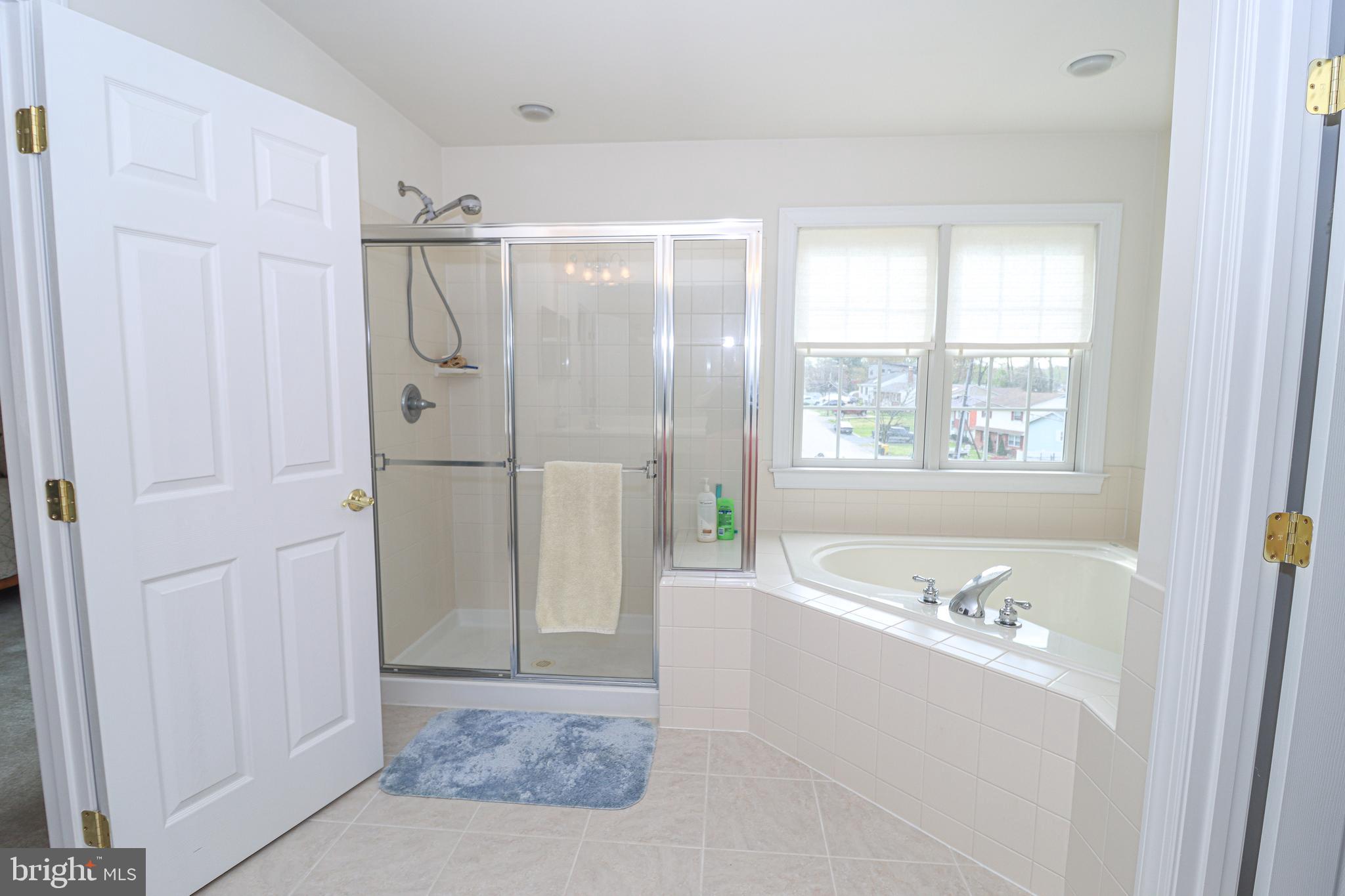 11 Johnson Road Pasadena, MD 21122 - Photo 37 of 56 Separate Shower w/ Custom Glass Doors