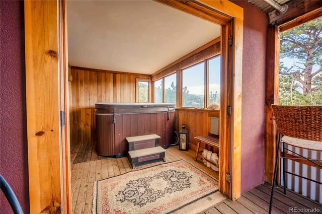 a view of porch with wooden floor and furniture
