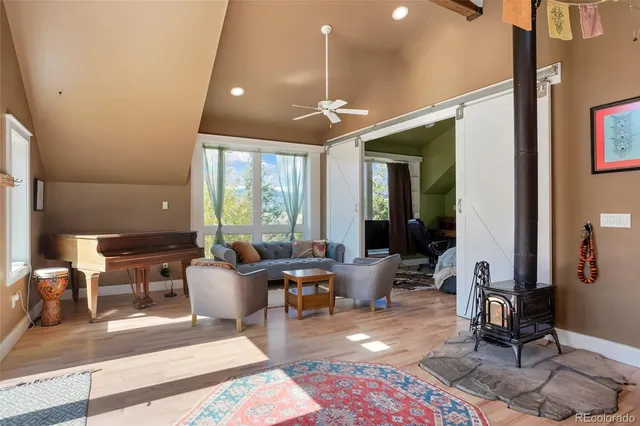 a view of a chairs and table in the balcony