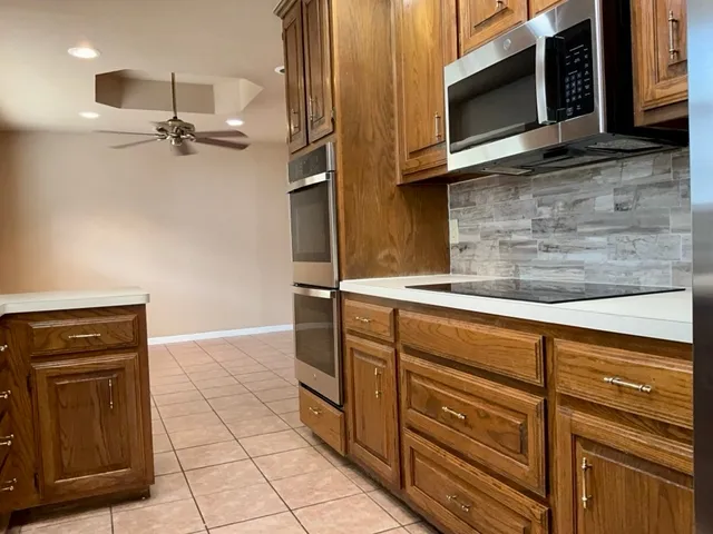 a bathroom with a sink a mirror and a bathtub