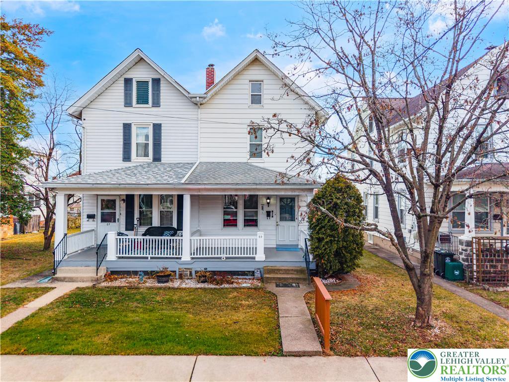 front view of house with a yard