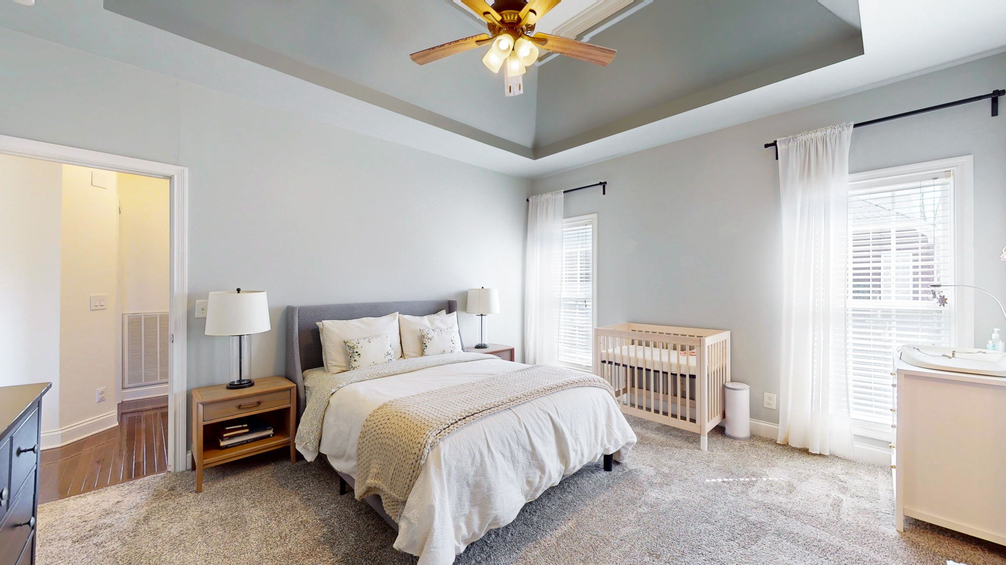 864 Bradshaw Road Lebanon, TN 37087 - Photo 14 of 41 a bedroom with a bed and a chandelier