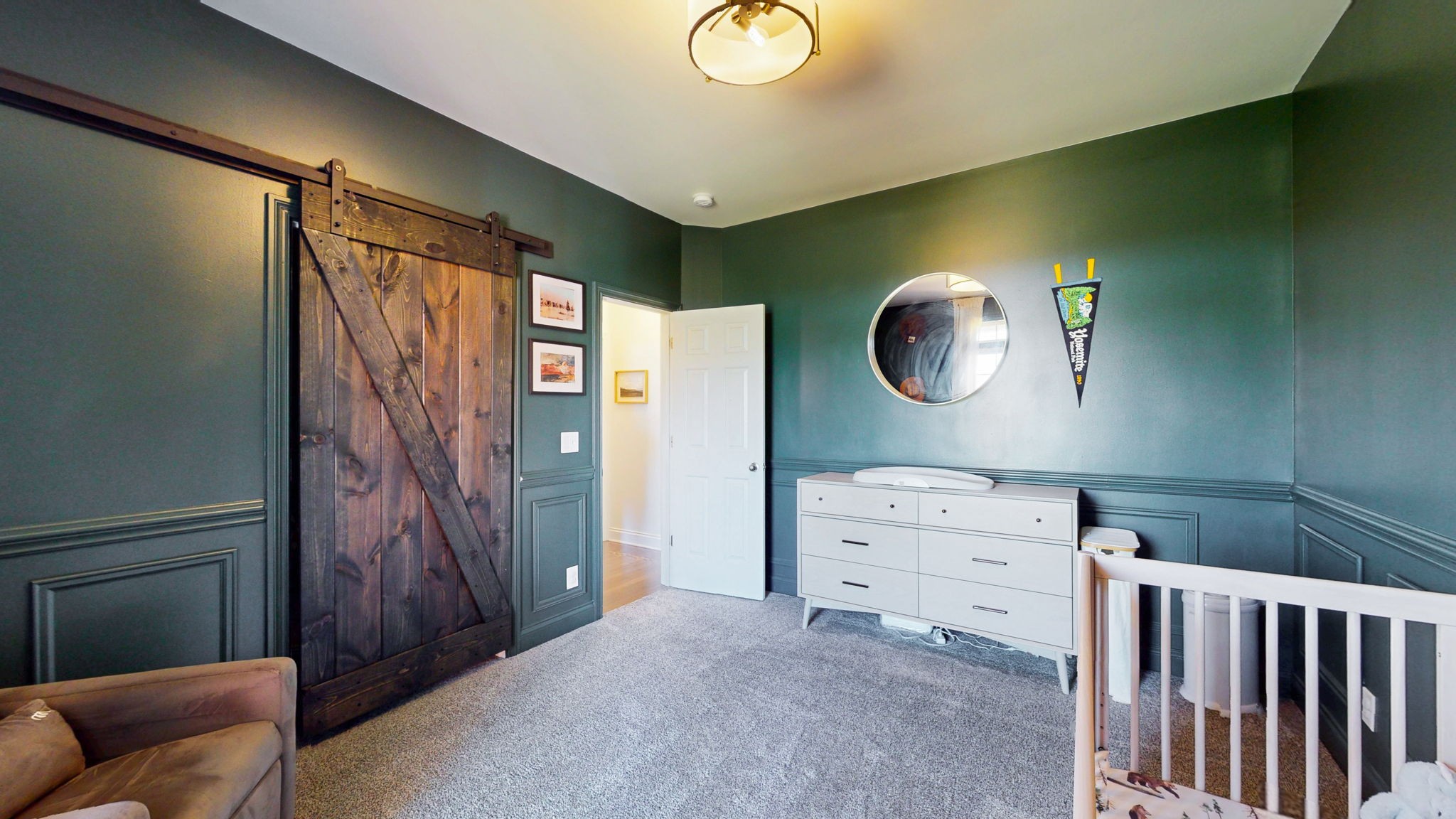 864 Bradshaw Road Lebanon, TN 37087 - Photo 25 of 41 a bedroom with a baby bed and a chair