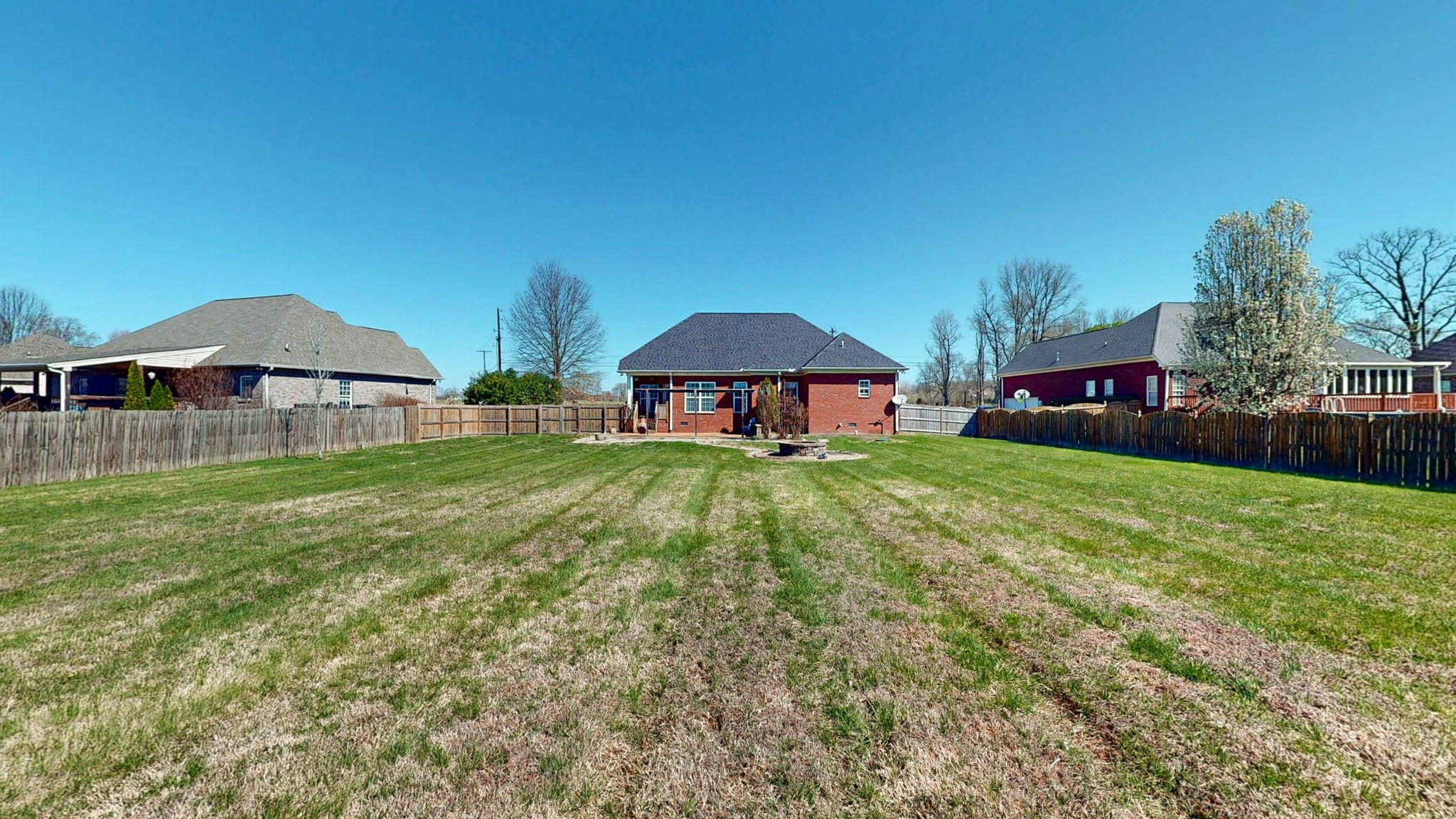 864 Bradshaw Road Lebanon, TN 37087 - Photo 32 of 41 a view of a house with backyard and a tree