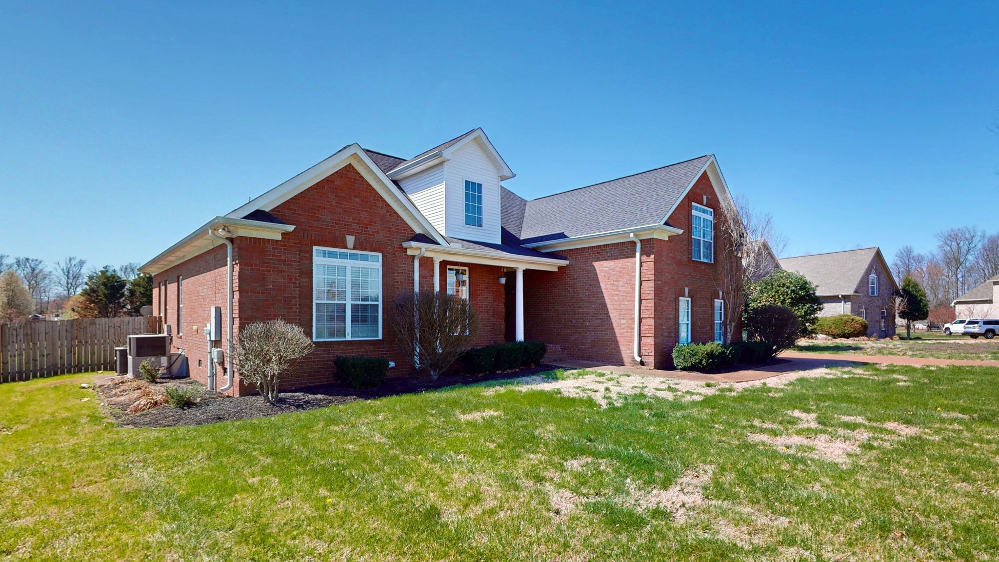 864 Bradshaw Road Lebanon, TN 37087 - Photo 4 of 41 a front view of a house with a yard