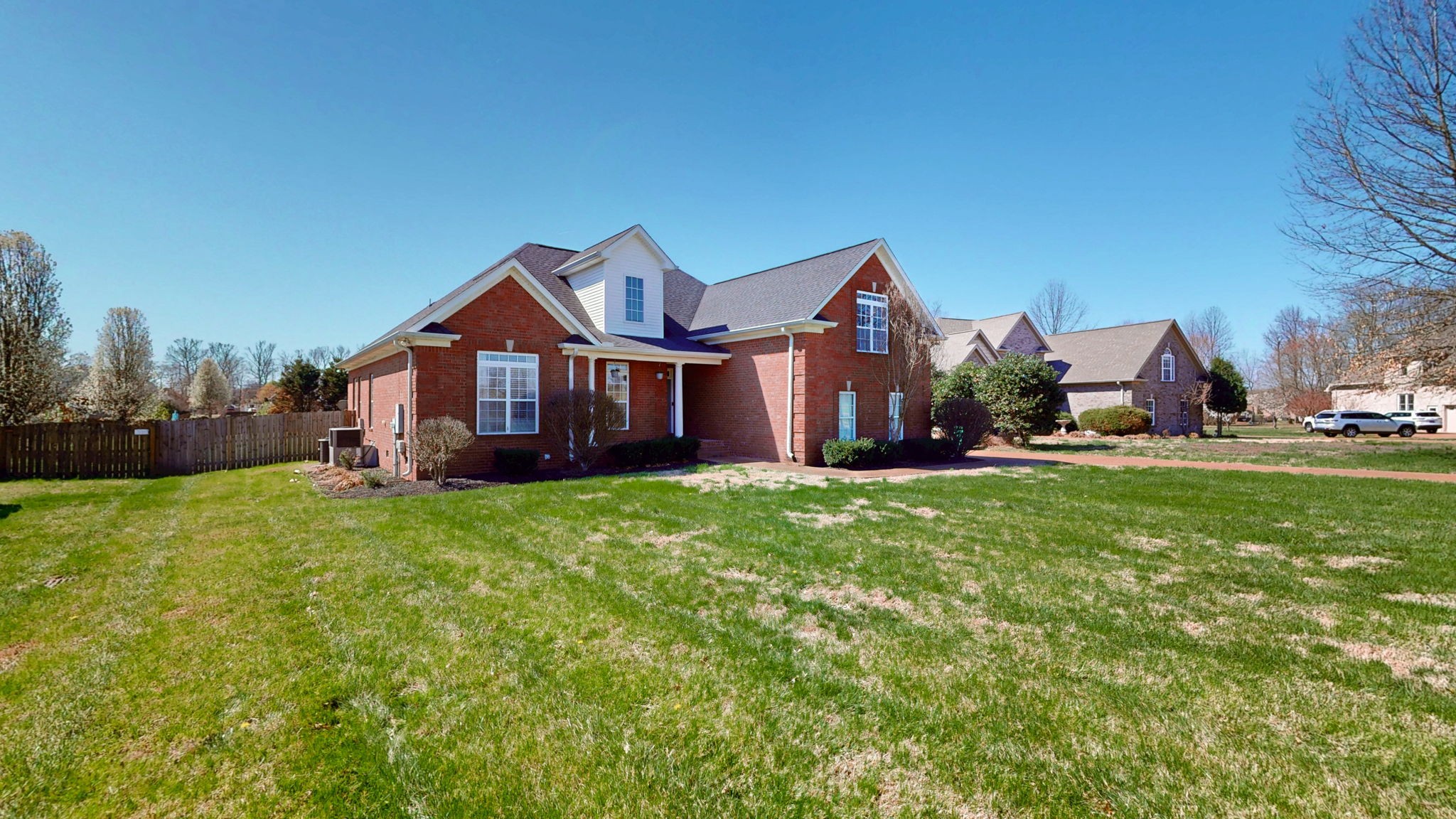 864 Bradshaw Road Lebanon, TN 37087 - Photo 5 of 41 a view of a big house with a big yard and large trees