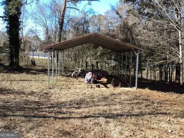 a backyard of a house with lots of green space