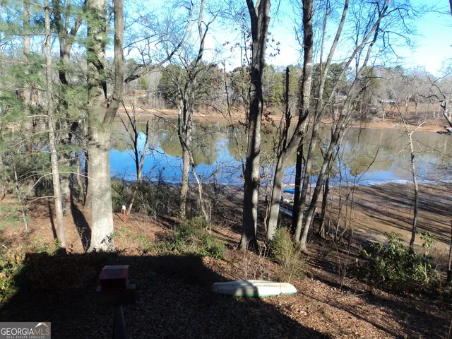 a view of a backyard of the house
