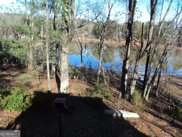 a view of a backyard of the house