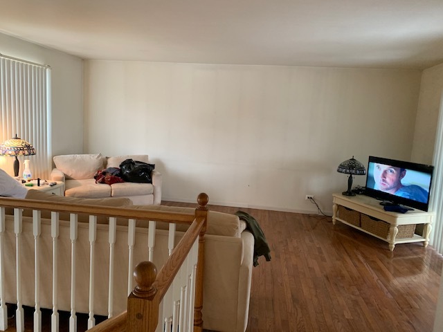 304 Thistle Drive Bolingbrook, IL 60490 - Photo 3 of 9 a bedroom with furniture and wooden floor