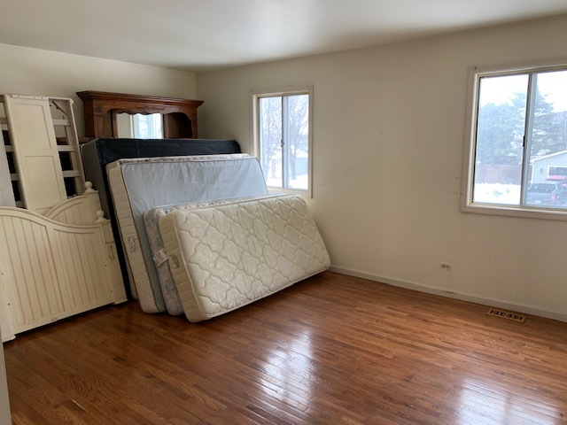 304 Thistle Drive Bolingbrook, IL 60490 - Photo 5 of 9 a living room with a couch and a window