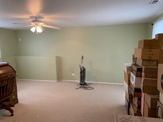 304 Thistle Drive Bolingbrook, IL 60490 - Photo 6 of 9 a view of a room with gym equipment