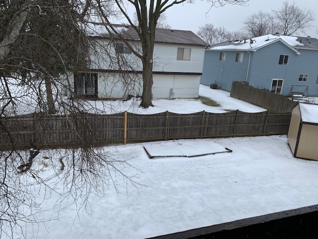 304 Thistle Drive Bolingbrook, IL 60490 - Photo 9 of 9 a view of a house with a snow