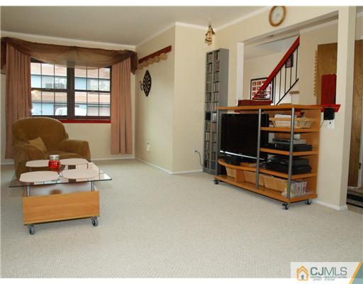 5605 Hana Road Edison, NJ 08817 - Photo 17 of 23 a bedroom with furniture and a window