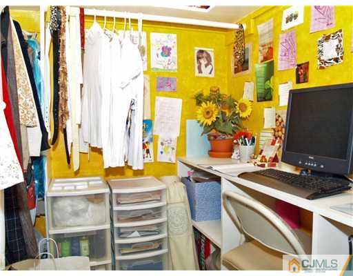 5605 Hana Road Edison, NJ 08817 - Photo 20 of 23 a room with musical instruments and furniture