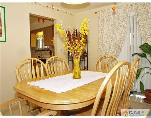5605 Hana Road Edison, NJ 08817 - Photo 3 of 23 a view of a dining room with furniture