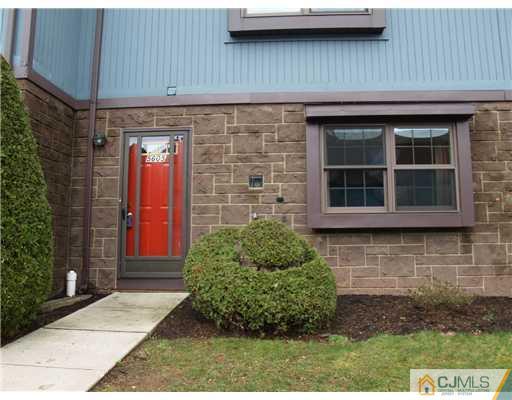 5605 Hana Road Edison, NJ 08817 - Photo 22 of 23 a front view of a house with a garden