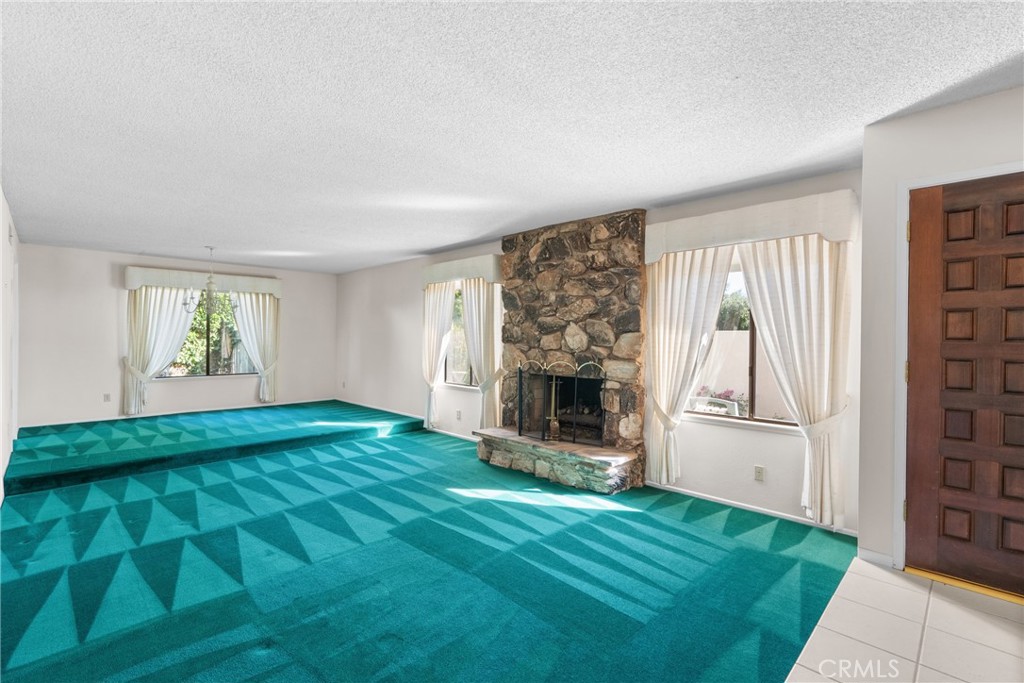 4347 Manchester Court Santa Maria, CA 93455 - Photo 6 of 40 a view of an empty room with window and fire place