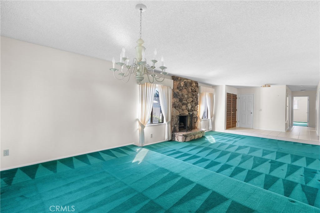 4347 Manchester Court Santa Maria, CA 93455 - Photo 7 of 40 a view of an empty room with window and fireplace