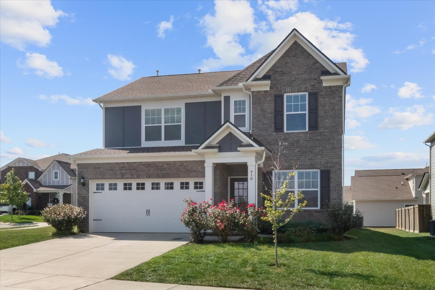 910 Sassafras Ct Spring Hill Spring Hill, TN 37174 - Photo 3 of 20 a front view of a house with garden