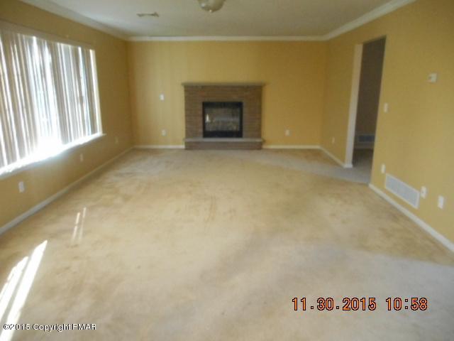 1609 Clover Road North Long Pond, PA 18334 - Photo 3 of 24 a view of an empty room with a window