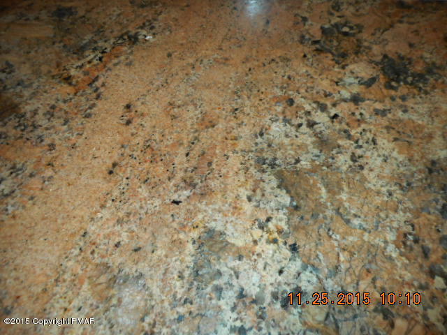 1609 Clover Road North Long Pond, PA 18334 - Photo 10 of 24 a brick wall with a shower in it