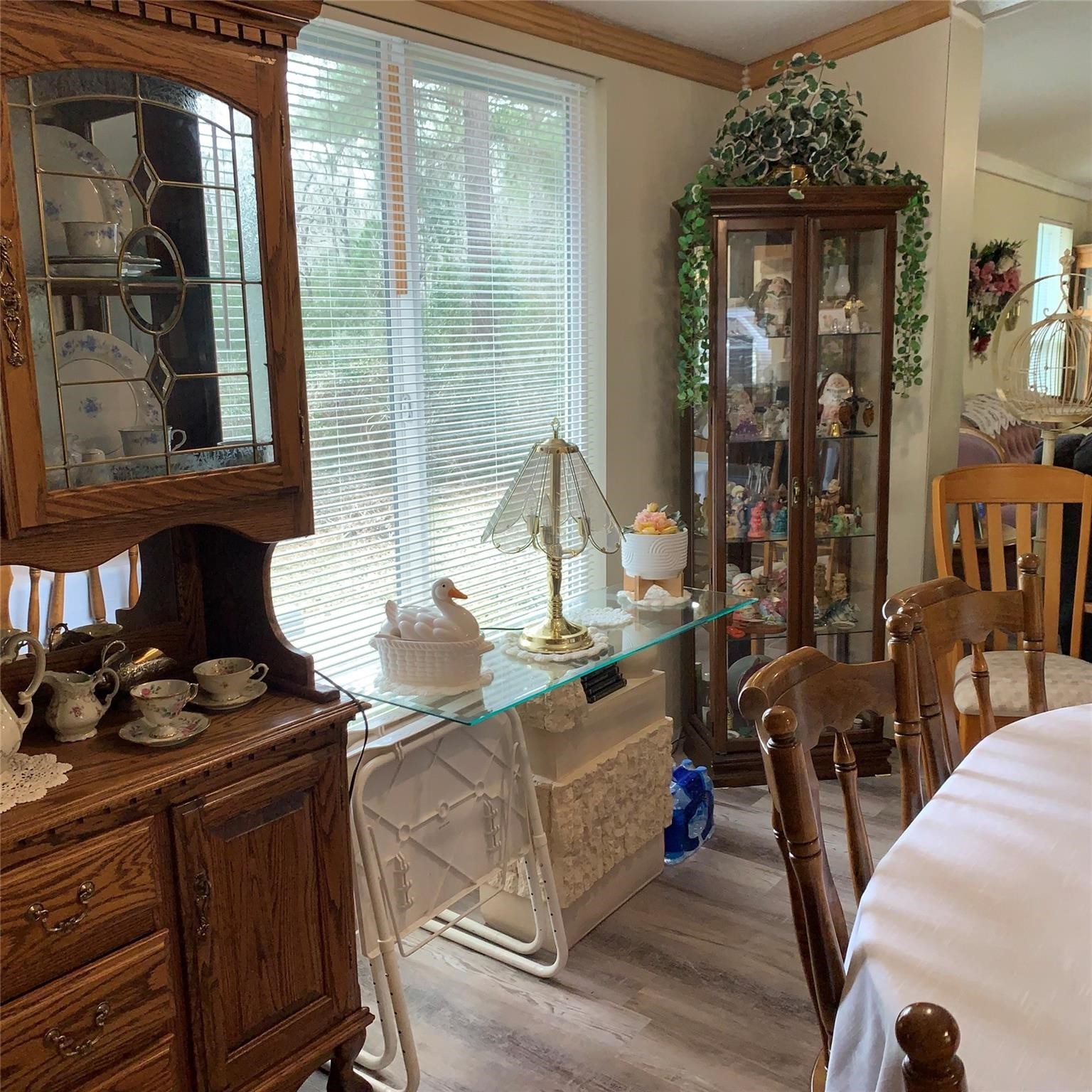 480 Sportsman Drive Trinity, TX 75862 - Photo 12 of 33 a living room with furniture a window and potted plants