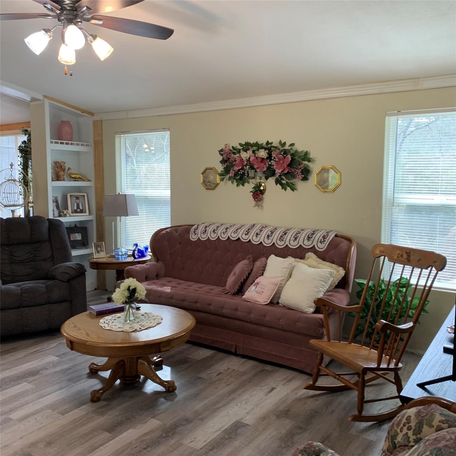 480 Sportsman Drive Trinity, TX 75862 - Photo 2 of 33 a living room with furniture flowers and a window