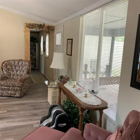 a bathroom with a sink mirror and a bathtub