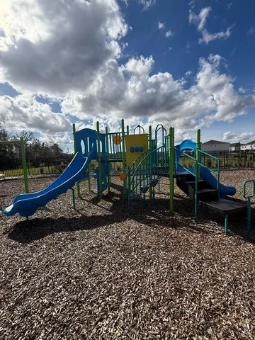 a view of a garden with a bench