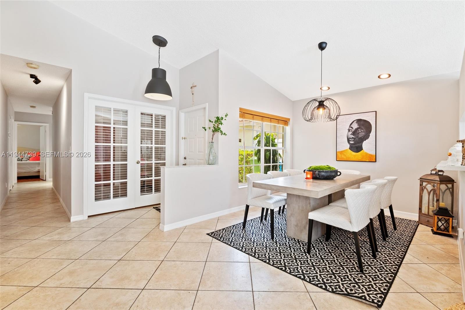 955 Azure Lane Weston, FL 33326 - Photo 8 of 34 a view of a livingroom with furniture and window